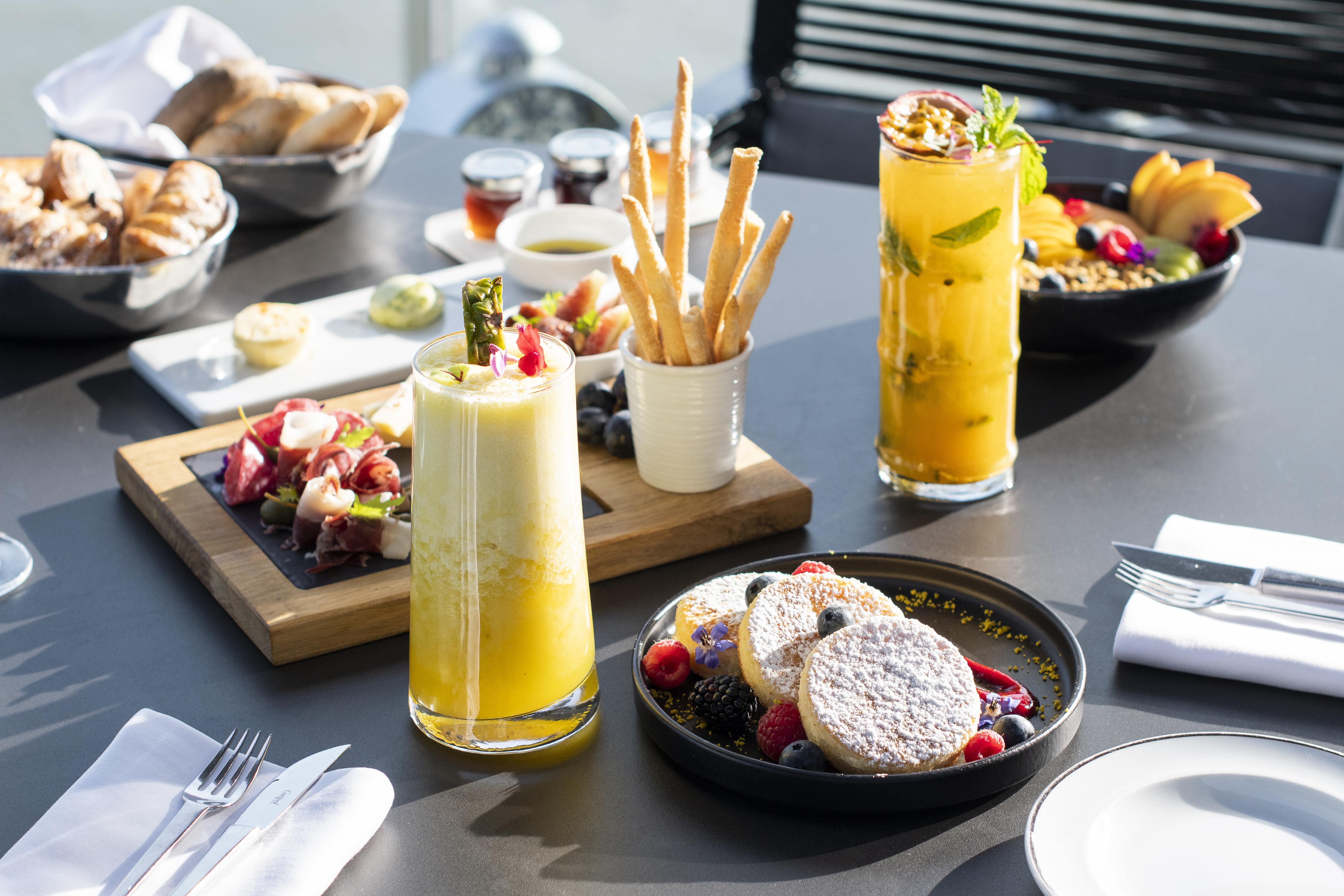 Myriad By Sana Hotels Lisbon Exterior photo A selection of food and drink at the restaurant